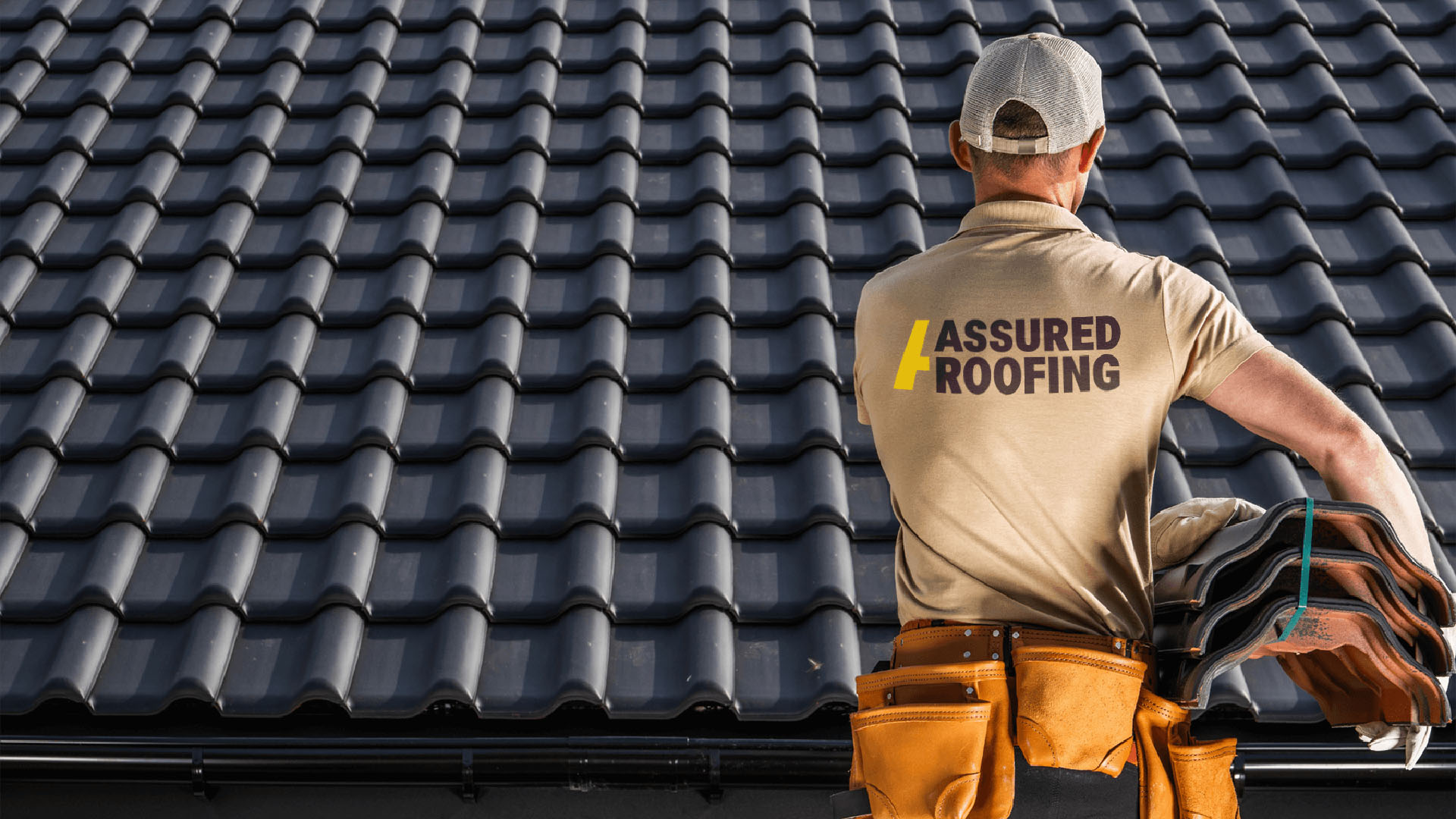 Roofer inspecting work