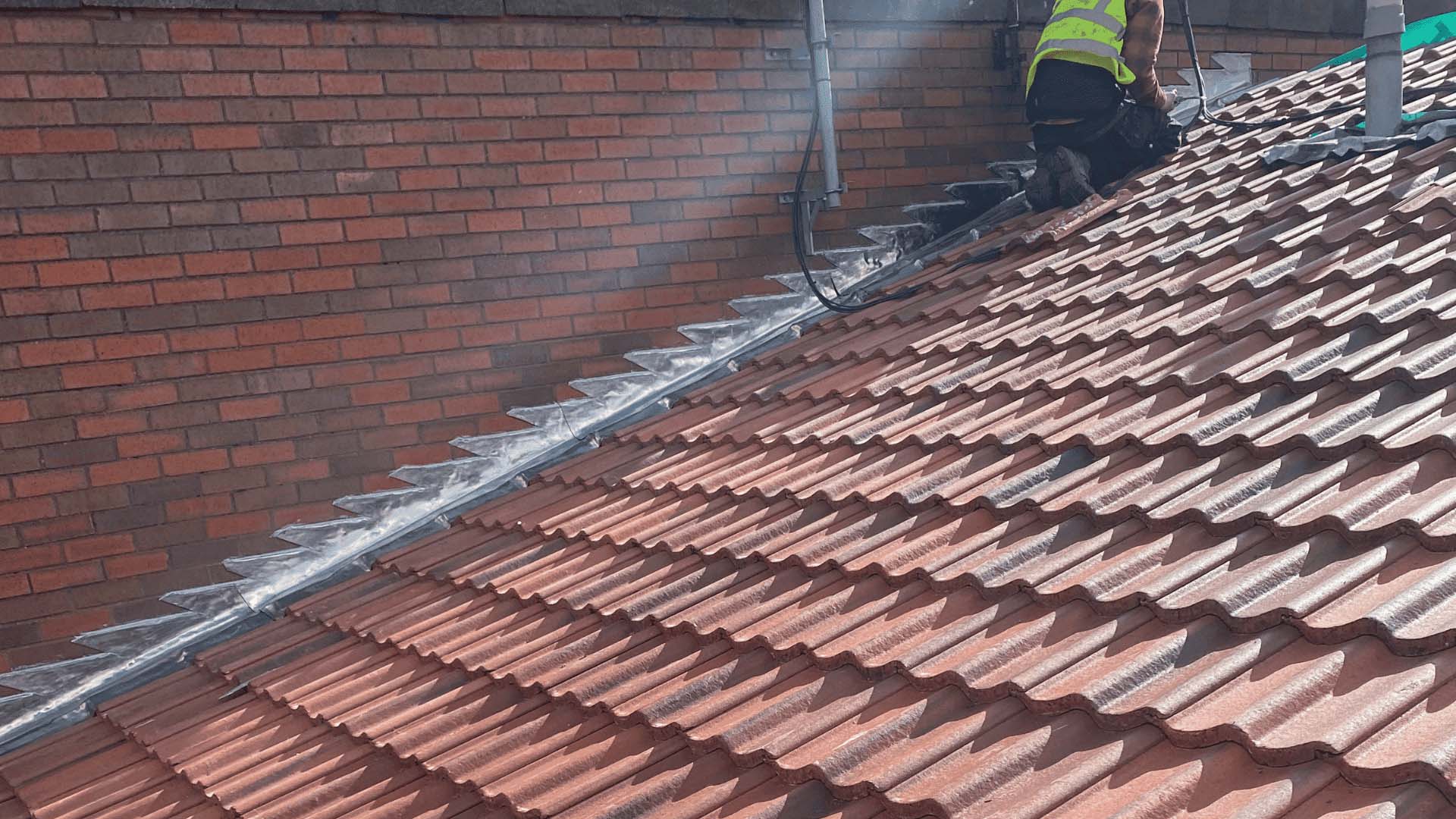 assured-roofing-leading-red-tiles