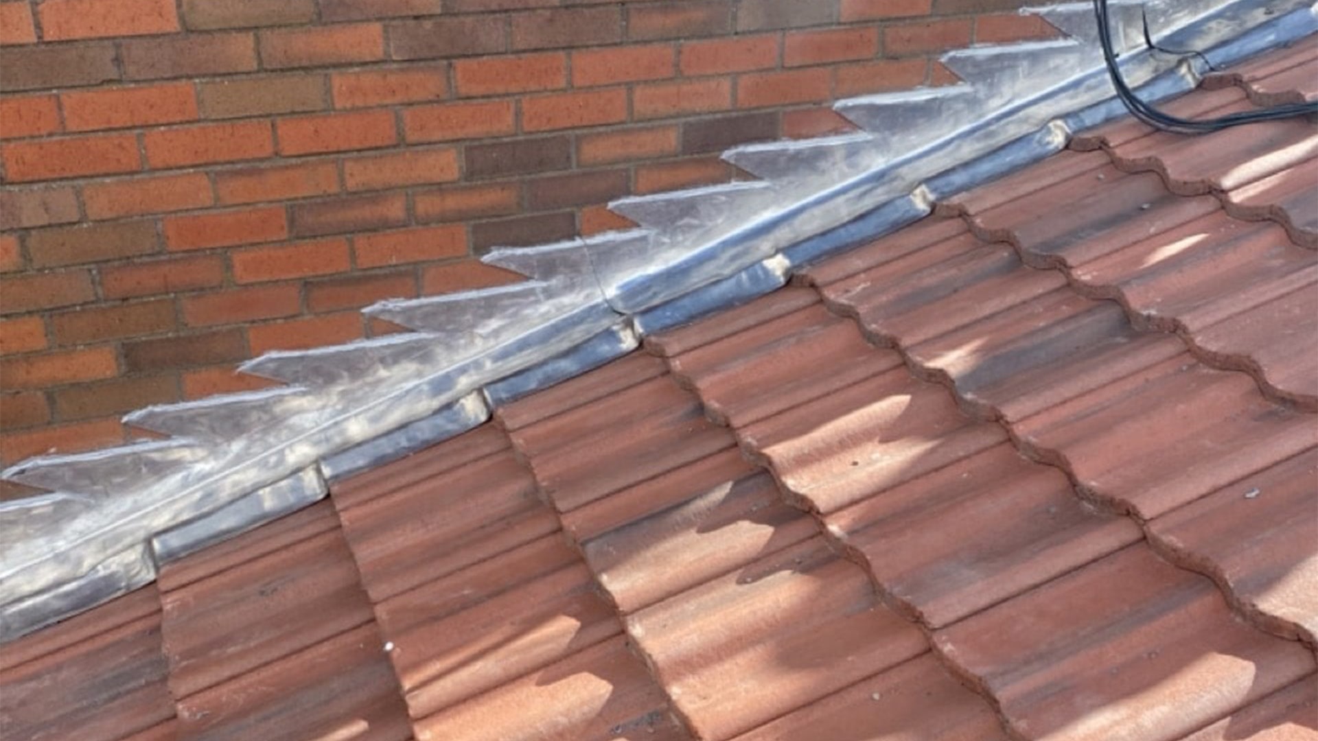 assured-roofing-red-tiles